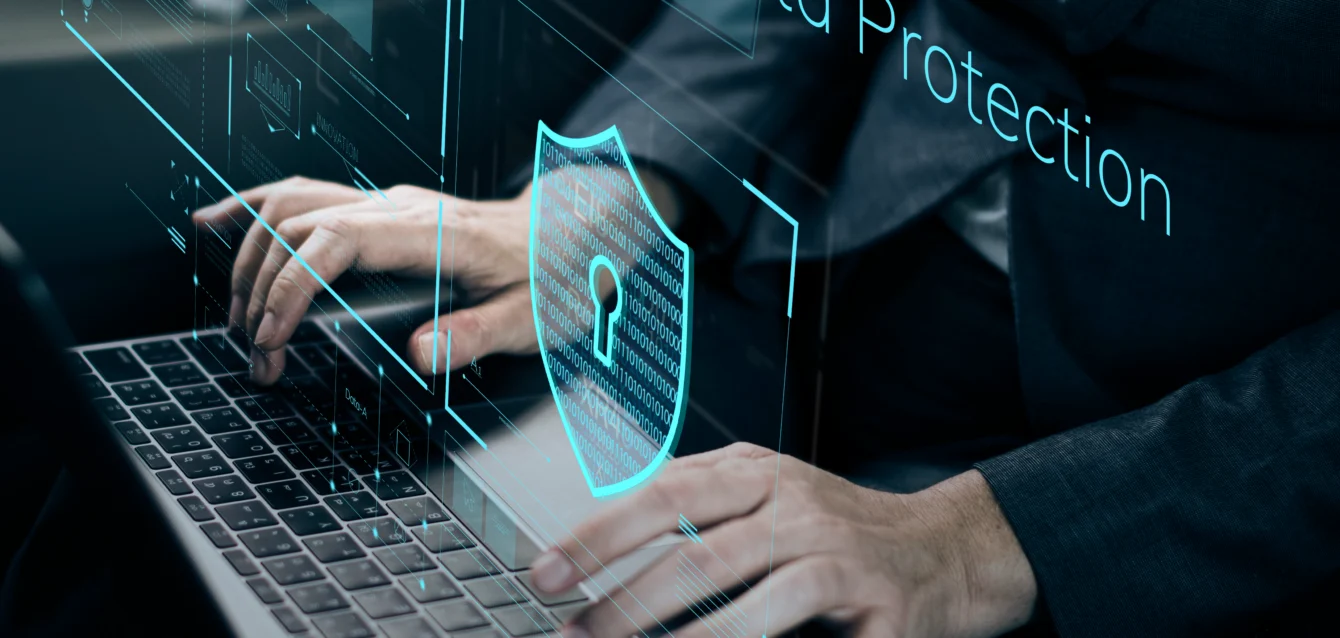 data-security-system-shield-protection-verification Illustration of data security system with shield icon, representing AI-powered protection and verification in cybersecurity