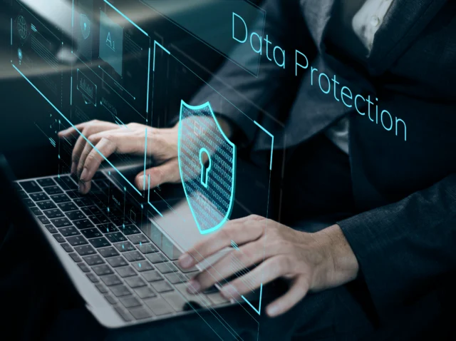 Illustration of data security system with shield icon, representing AI-powered protection and verification in cybersecurity