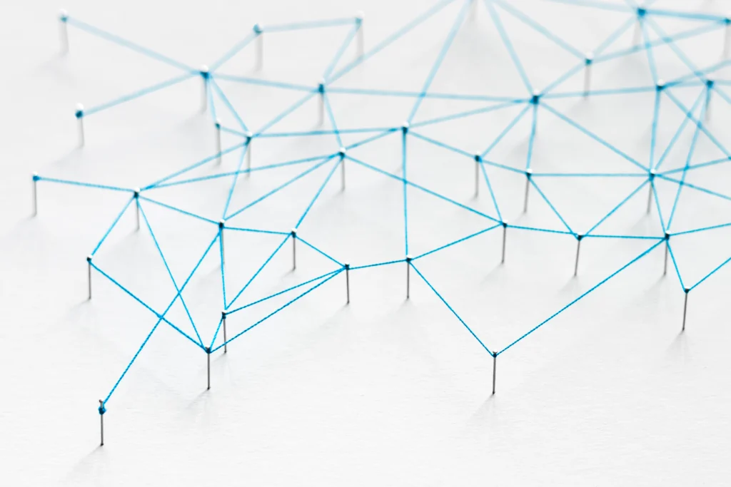 Geometric abstract background with connecting dots and lines, symbolizing modern technology, AI networks, and proactive cybersecurity systems.