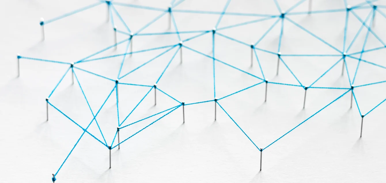 Geometric abstract background with connecting dots and lines, symbolizing modern technology, AI networks, and proactive cybersecurity systems.