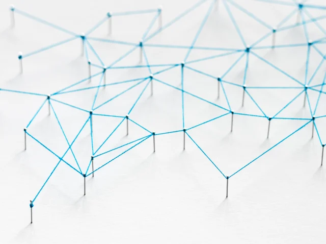 Geometric abstract background with connecting dots and lines, symbolizing modern technology, AI networks, and proactive cybersecurity systems.