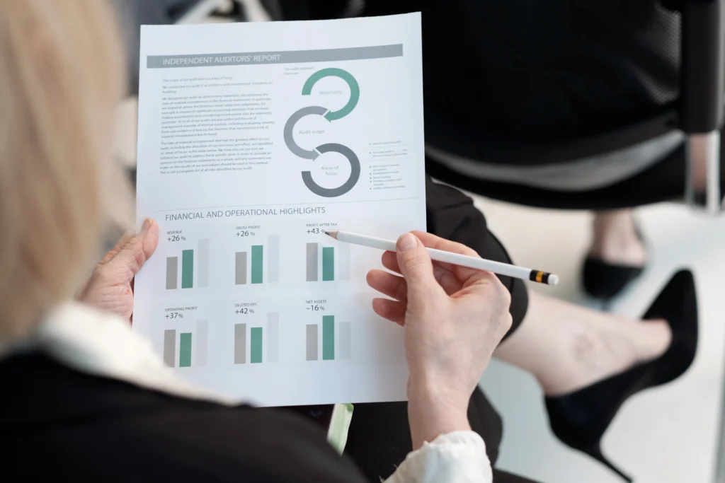 Hand of female analyst with a case study document